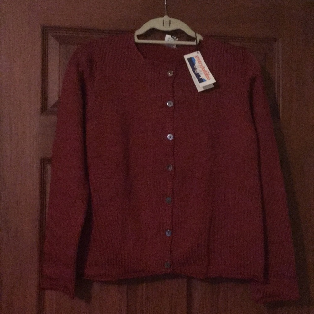 Cardigan and turtle neck sleeveless top